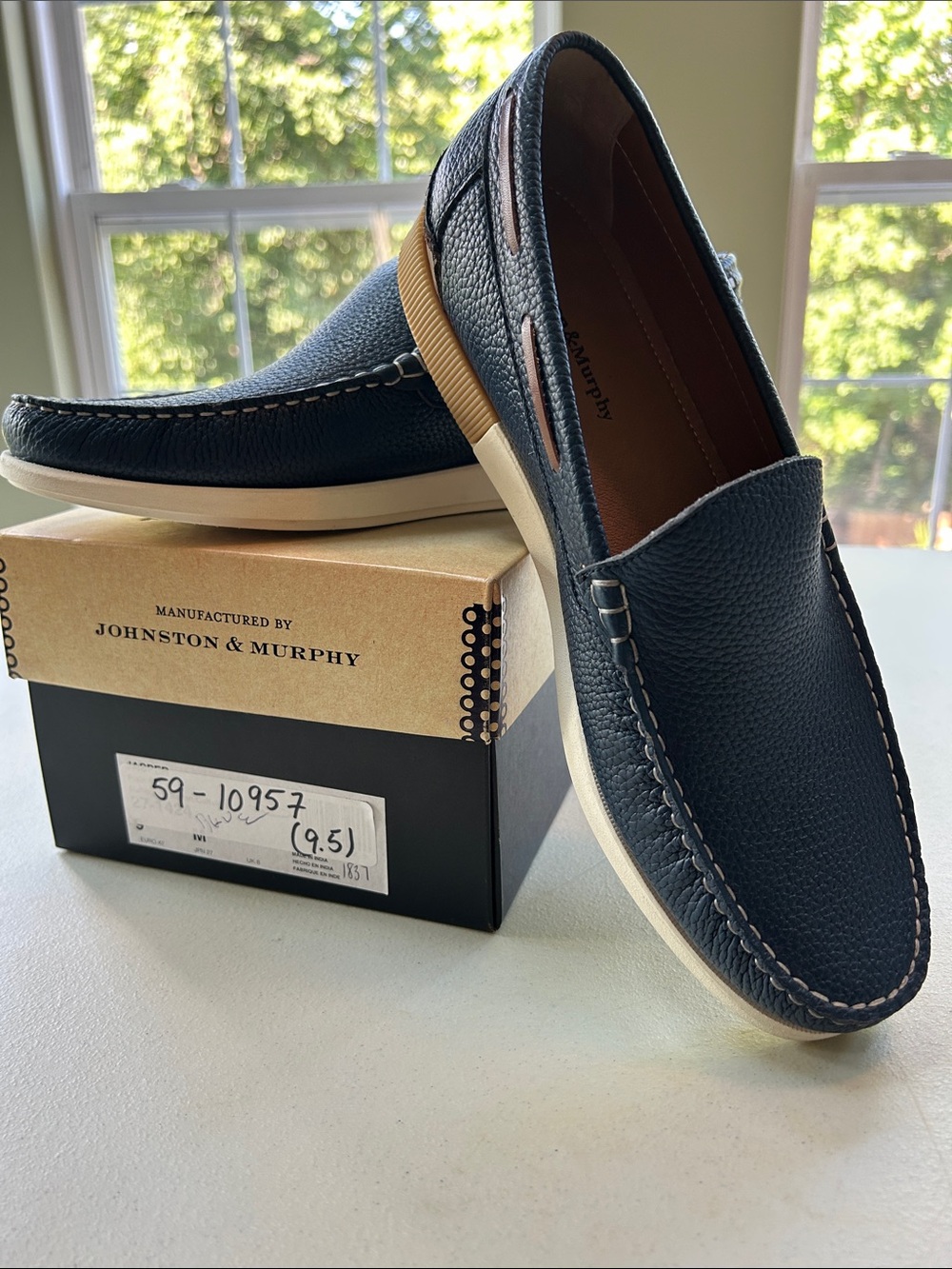 Johnston & Murphy Navy Leather Slip-On Moccasins with Tan Accents